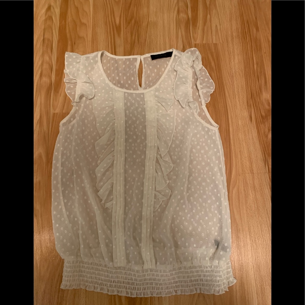 Swiss dot cream tank.